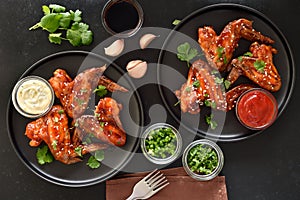 Baked chicken wings on plate