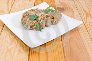 Baked chopped pork liver pate on dish closeup