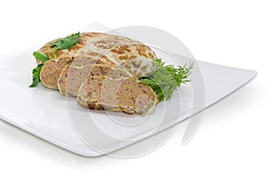 Baked chopped pork liver pate on white square dish closeup