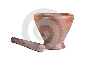 Baked clay mortar and wood pestle on white background