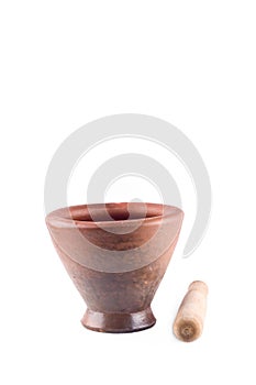 Baked clay mortar and wood pestle on white background cooking kitchenware object isolated