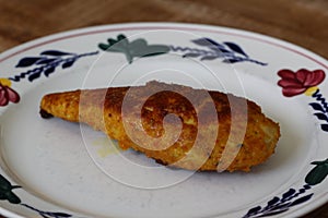 baked cordon bleu or schnitzel cordon bleu on plate