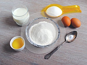 Baked cupcakes for easter on the table, ingredients
