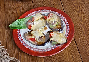 Baked eggplant with chicken and cheese