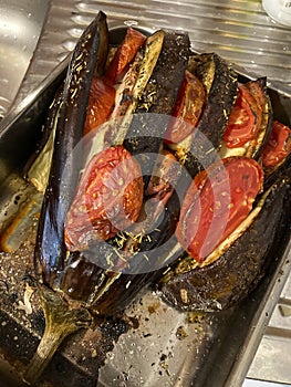 Baked eggplant with tomat, chees, herbs and spices after