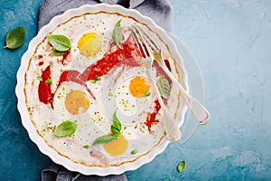 Baked eggs shakshouka in baked form