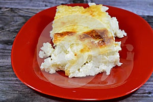 Baked Egyptian rice or Roz muammar's combination of rice, fresh cream, milk, ghee or butter, a very popular Egyptian dish, a