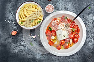 Baked feta pasta ingredients. rending feta pasta with cherry tomatoes herbs and garlic. banner, menu recipe place for text, top photo