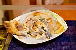 Baked flounder fish with potatoes