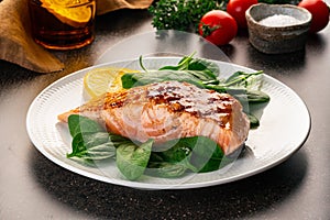 Baked or fried salmon and salad, Paleo, keto, fodmap, dash diet. Mediterranean food with steamed fish