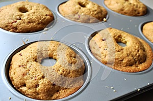Baked fruit sponge cakes in a mini kugelhopf baking tray detail Recipe sequence