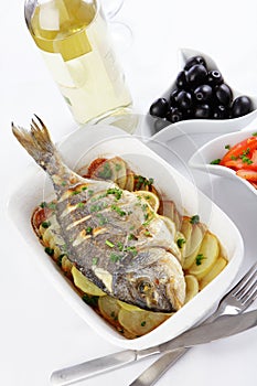 Baked gilt-head sea bream photo