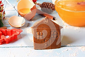Baked ginger cookies gingerbread house christmas background