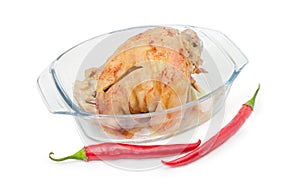 Baked ham hock in glass casserole pan and chili beside