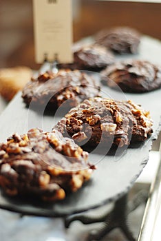 Baked healthy cookies in a vitrine of a cafe photo