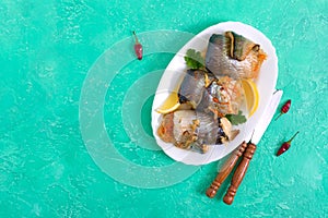 Baked herring stuffed with vegetables. Delicious fish rolls. The top view
