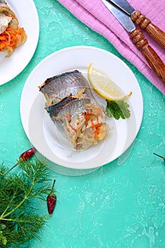 Baked herring stuffed with vegetables. Tasty fish rolls. The top view