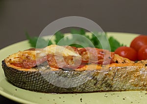 Baked juicy salmon steak close-up