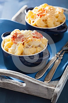 Baked macaroni with cheese in blue casserole