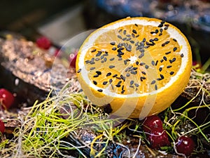 Baked mackerel is decorated with lemon and greens