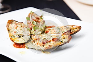 Baked mussels with parmigiano