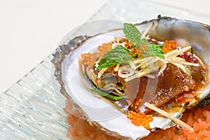 Baked oyster shell spicy sauce.