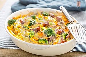 Baked pasta penne with broccoli smoked pork neck mozzarela cheese and othe ingredients