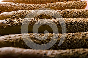 Baked pastry food with sesame seeds. traditional breakfast snack