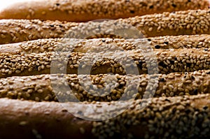 Baked pastry food with sesame seeds. traditional breakfast snack