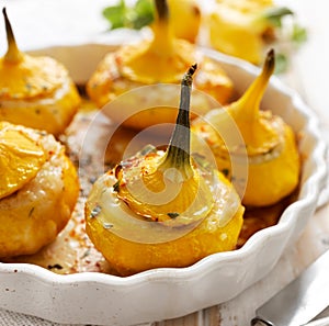 Baked Pattypan squash , stuffed with cheese