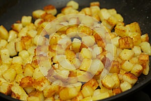 Baked pieces of potatoes