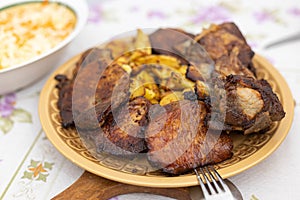 Baked Pork Ribs and Chops with Potatoes served on the plate