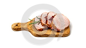 Baked Pork Slices on Wooden Cutting Board. Roasted Sliced Loin, Tenderloin Ham Piece