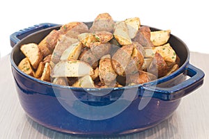 Baked potato in a blue pot