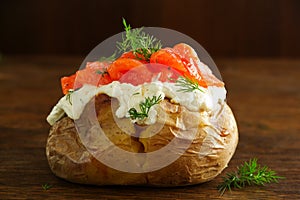 Baked potato with cream of the cream cheese and salted salmon,