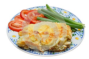 Baked potato pudding with tomato and spring onion