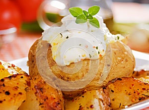 Baked potato with sour cream sauce