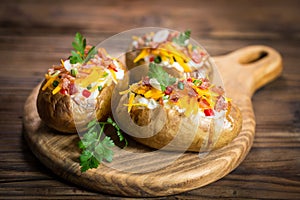 Baked potatoes with cheese and bacon photo