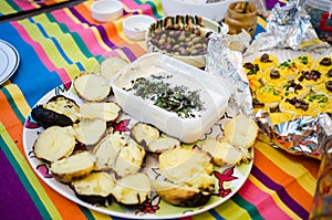 Baked potatoes and cheese dip