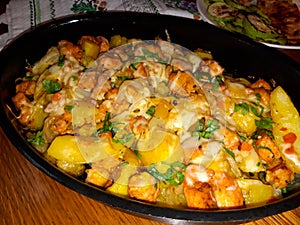 Baked potatoes with chicken breast and cheese. Cartofi Gratinati