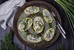 Baked potatoes filled with fresh mushrooms