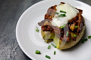 Baked potatoes with tomato sauce