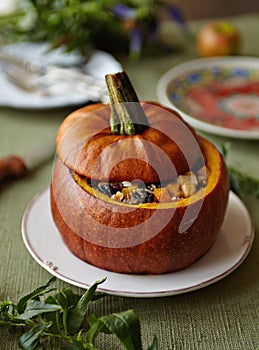 Baked Pumpkin with Rice and Fruits Stuffing