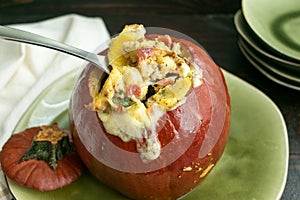 Baked Pumpkin Stuffed with Melted Cheese