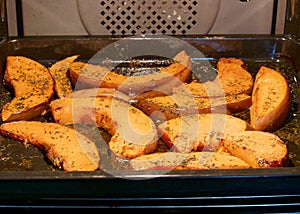 Baked pumpkin with thyme. Spicy food gourmet