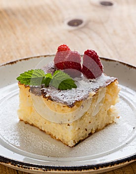 Baked rice pudding with raspberry