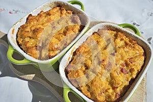 Baked or roasted egg pie or kind of quiche, french style snack baked in small roasting pan.