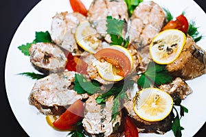 Baked salmon fish fillet with tomatoes, mushrooms and spices. Diet menu. Top view. Flat lay