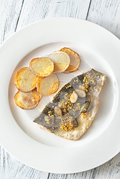 Baked sea bass with capers