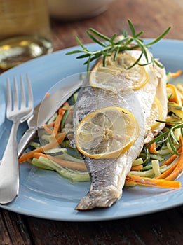 Baked sea bass with vegetables